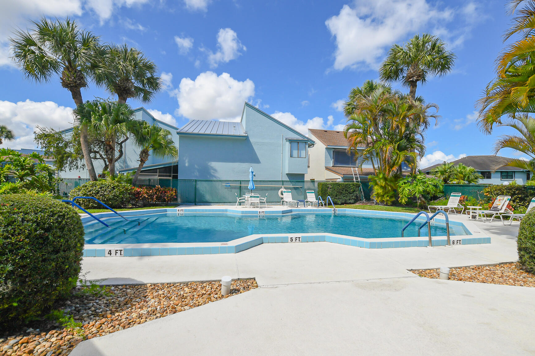 950 South Kanner Highway, Unit 905 Stuart, FL 34994 - Photo 29 of 34 a view of a house with a yard and a fountain