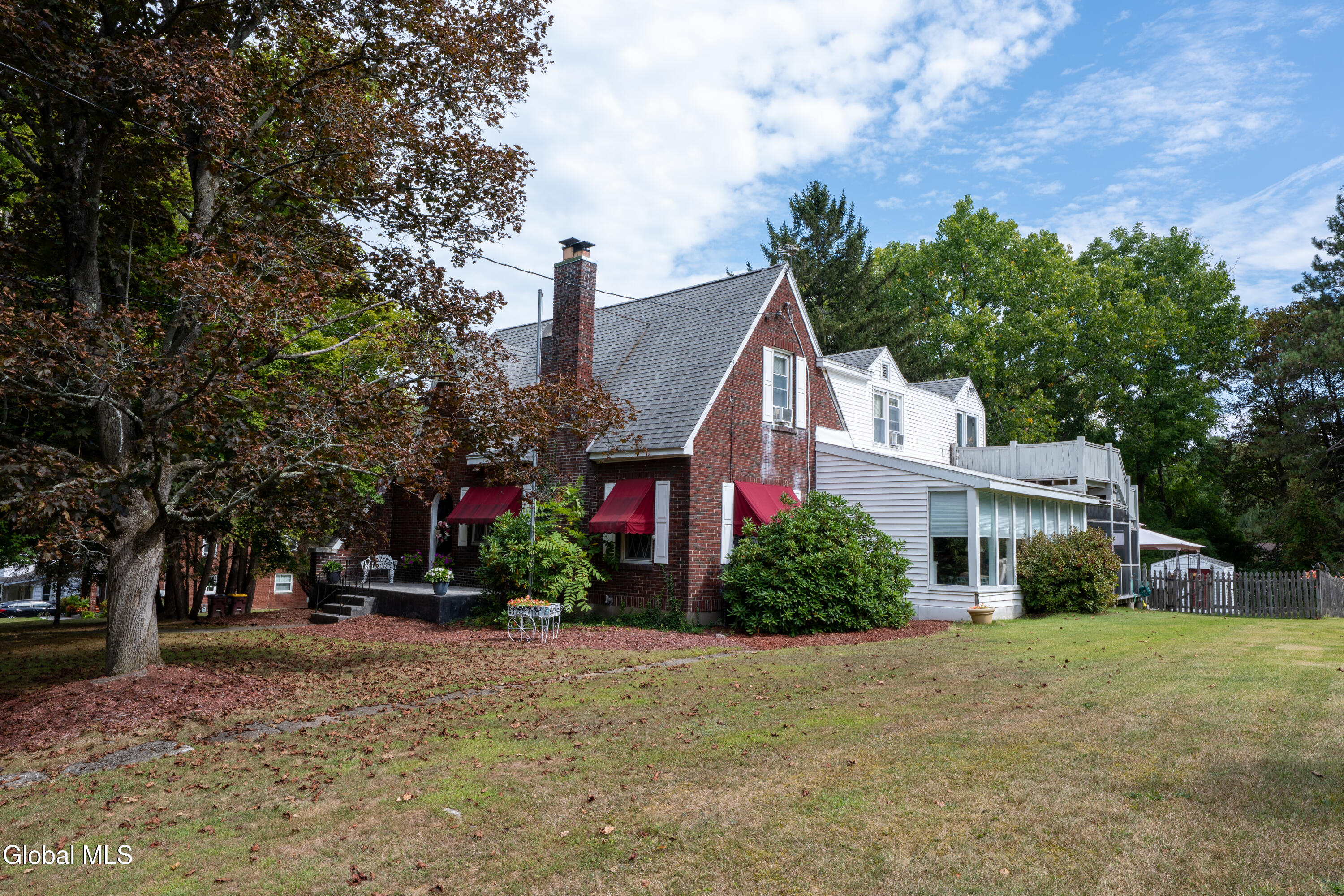 20 Chester Court Brunswick, NY 12182 - Photo 4 of 42 Right side- Four season-sunroom view