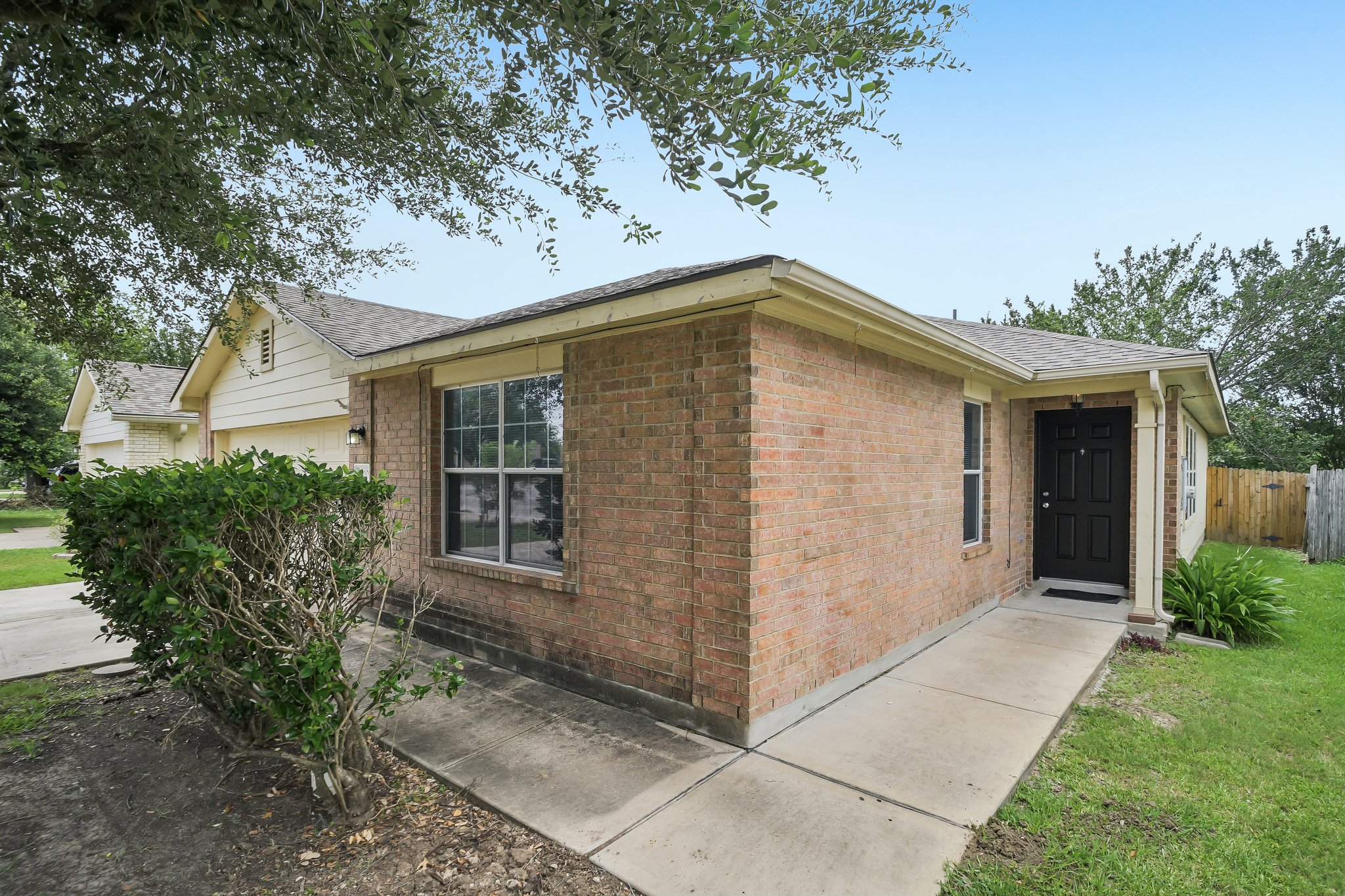 610 Lavaca Loop Elgin, TX 78621 - Photo 3 of 37 A classic brick exterior with a welcoming entryway awaits.