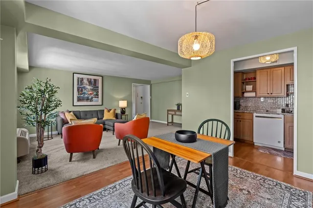 a kitchen with granite countertop cabinets stainless steel appliances and a sink