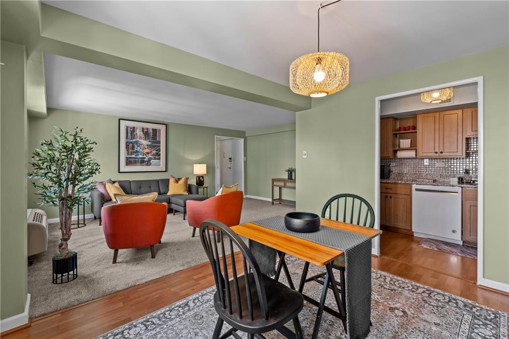 4625 Fifth Avenue, Unit 206 Pittsburgh, PA 15213 - Photo 15 of 31 a dining room with furniture and wooden floor