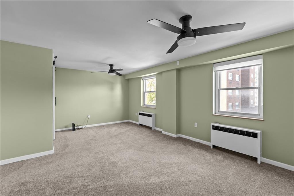 4625 Fifth Avenue, Unit 206 Pittsburgh, PA 15213 - Photo 20 of 31 a view of an empty room with a window