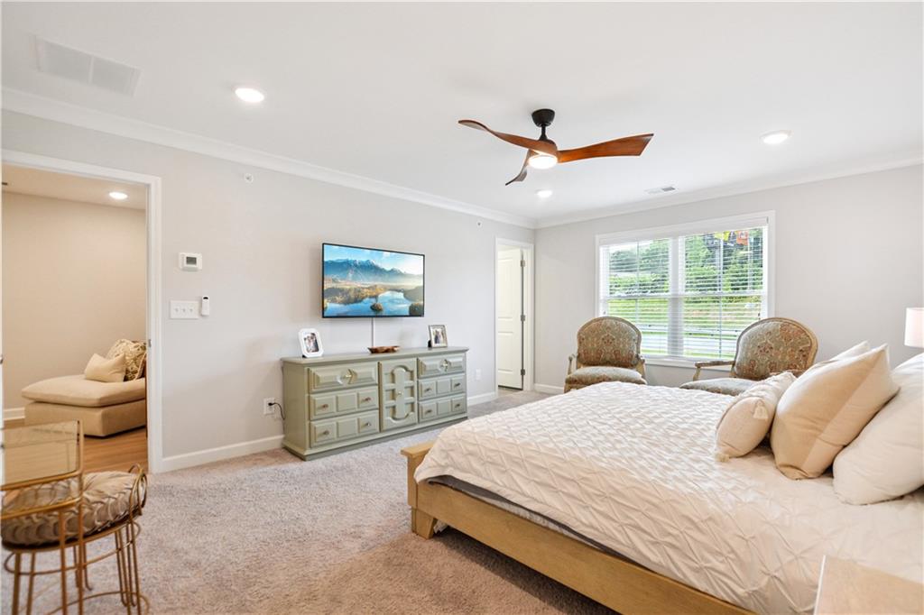 765 Trevett Way Marietta, GA 30066 - Photo 19 of 44 a bedroom with a bed and furniture