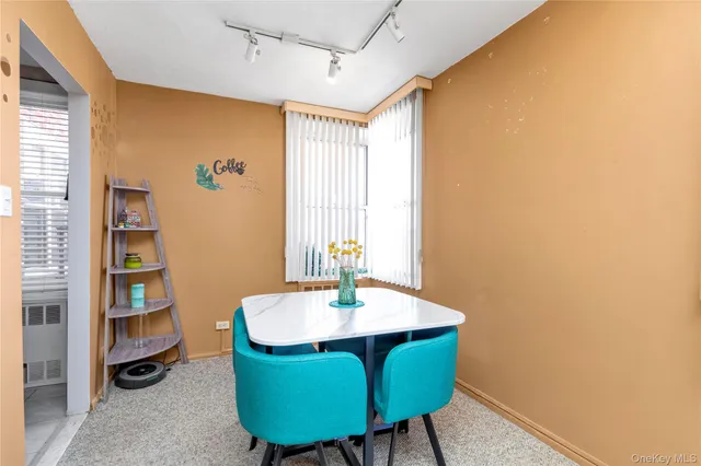 a room with furniture and a window