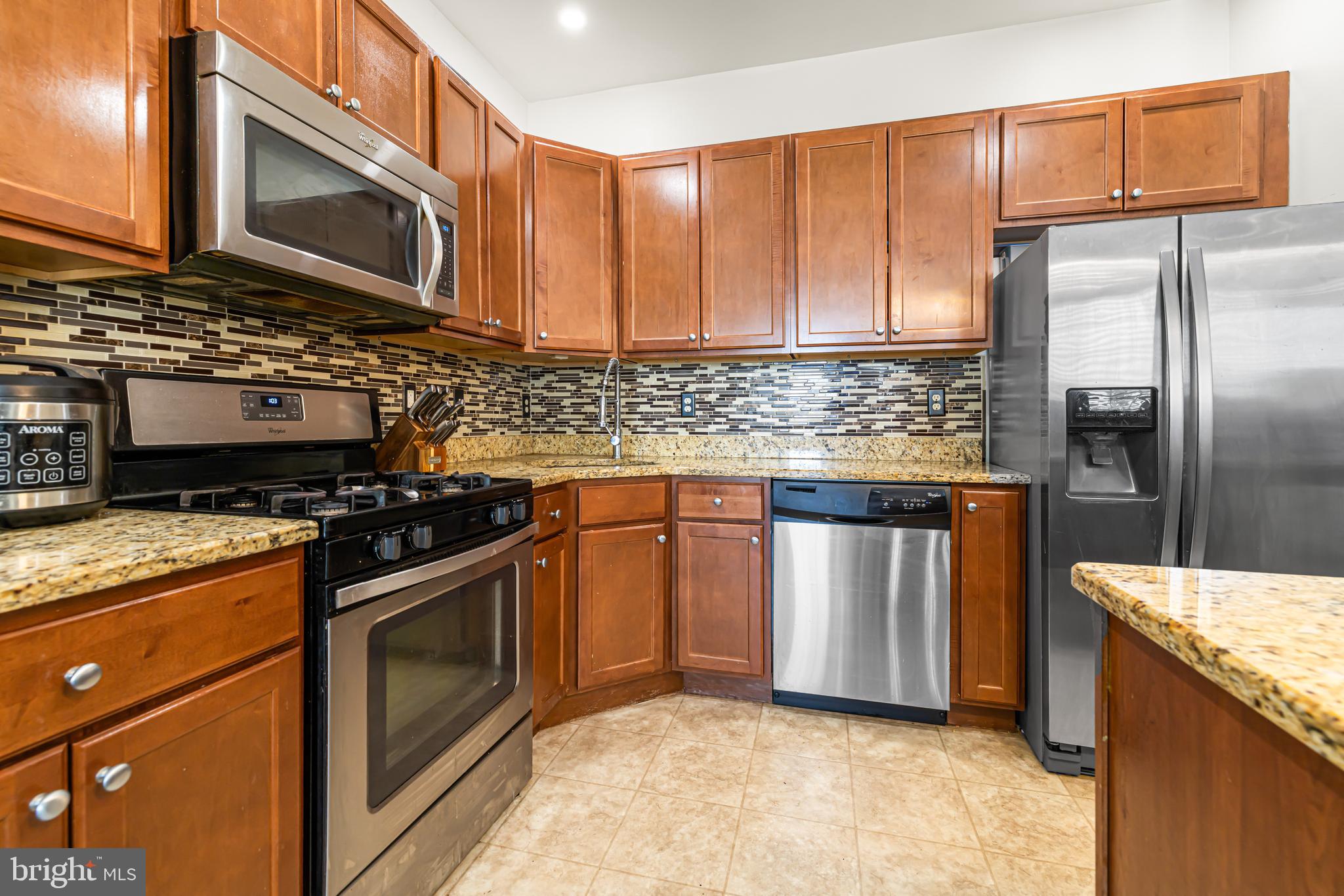 303 Ross Court Wyncote, PA 19095 - Photo 11 of 26 Kitchen includes granite countertops
