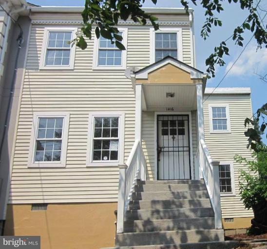 1416 Morris Road Southeast Washington, DC 20020 - Photo 1 of 12 Renovated two-story Colonial, back from street.