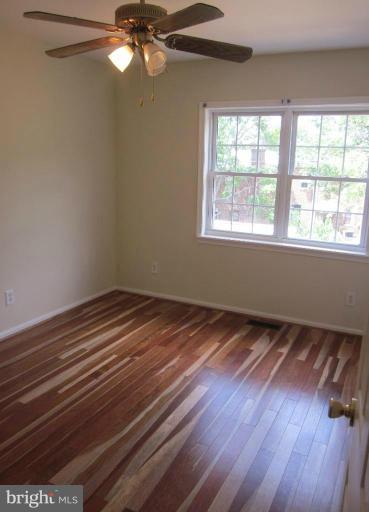 1416 Morris Road Southeast Washington, DC 20020 - Photo 6 of 12 Rear-facing bedroom with ceiling fan.