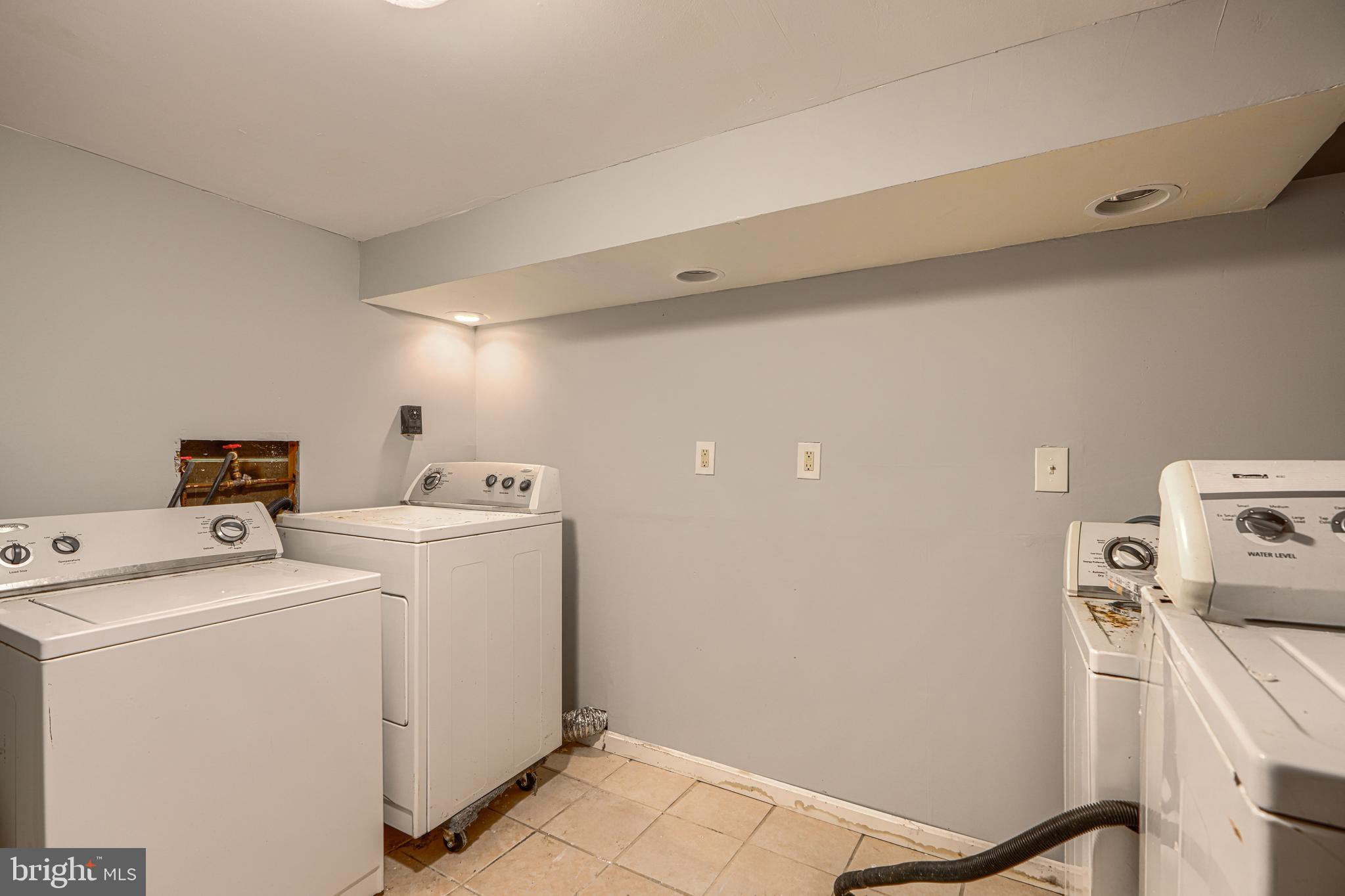 9706 Liberty Road Randallstown, MD 21133 - Photo 38 of 43 a utility room with dryer and washer