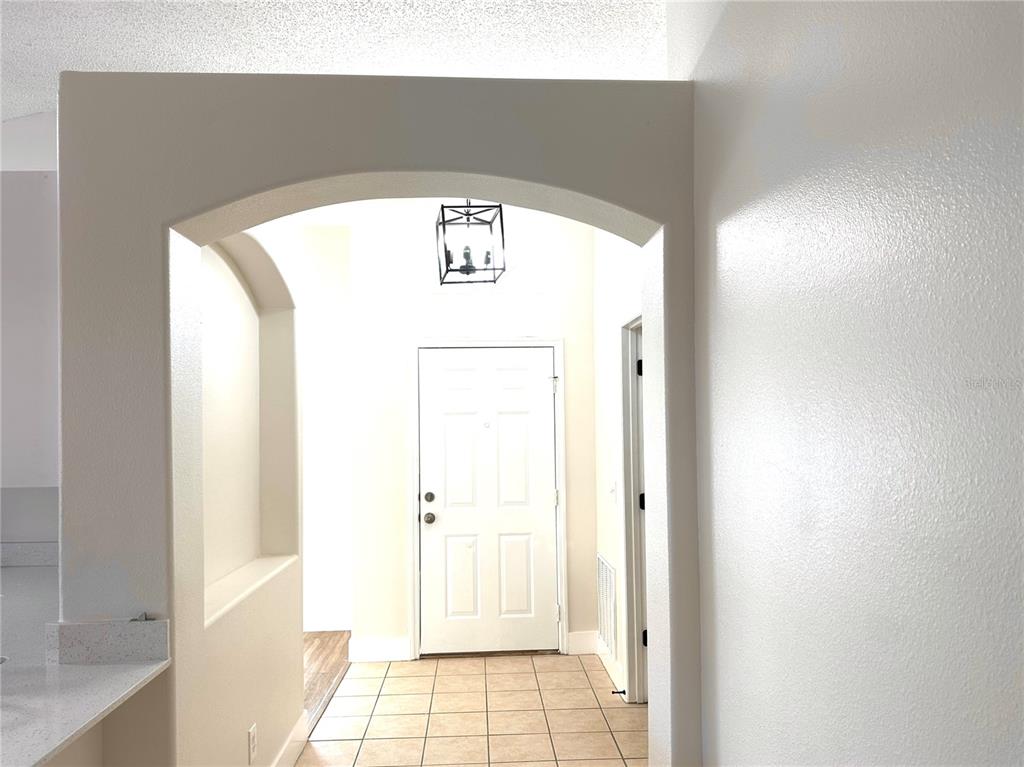 1758 Clarcona Road Apopka, FL 32703 - Photo 3 of 20 a view of a hallway