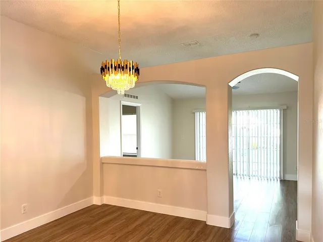 a front view of a house with wooden floor