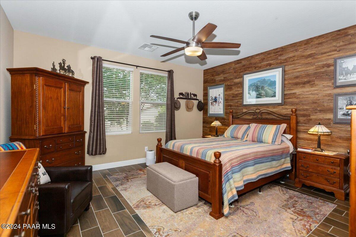 2206 Calgary Drive Prescott, AZ 86301 - Photo 14 of 54 a bedroom with a bed and wooden floor