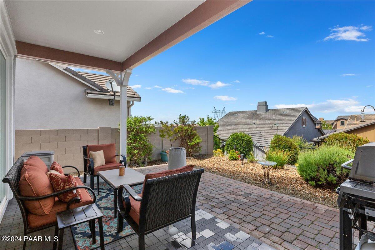 2206 Calgary Drive Prescott, AZ 86301 - Photo 25 of 54 a outdoor living space with furniture and a fireplace