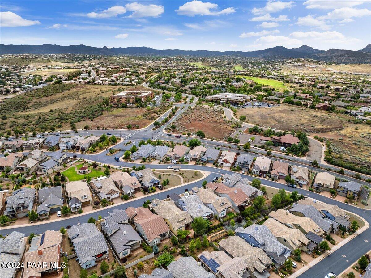2206 Calgary Drive Prescott, AZ 86301 - Photo 32 of 54 an aerial view of a city with lots of residential buildings and mountain view in back