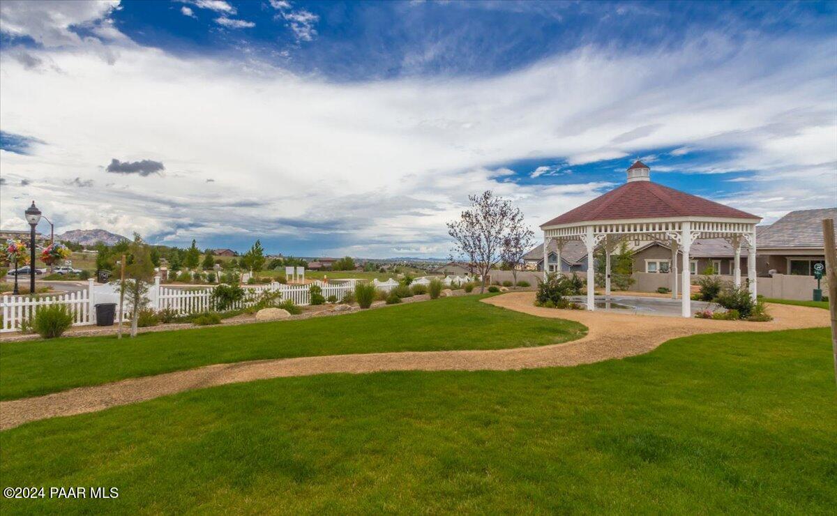 2206 Calgary Drive Prescott, AZ 86301 - Photo 36 of 54 a front view of a house with a garden