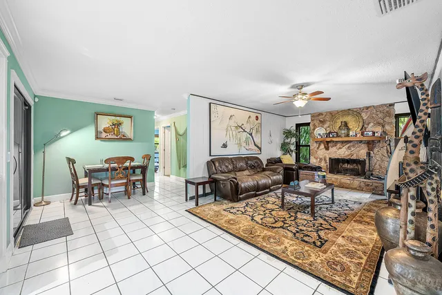 a living room with furniture and a rug