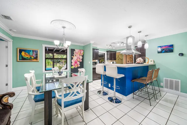 a view of a dining room with furniture