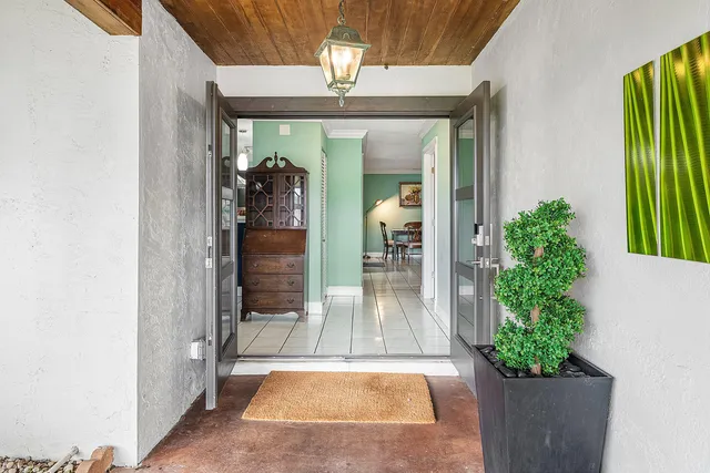 a view of a entryway door front of house