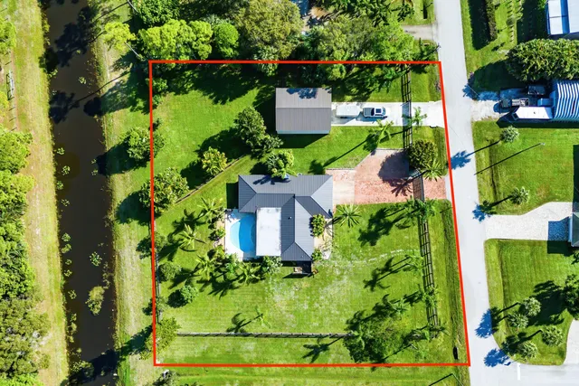 an aerial view of a yard with plants