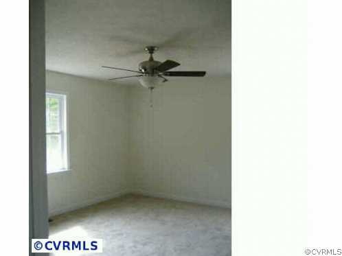 2225 Turkey Island Road Crewe, VA 23930 - Photo 4 of 6 a view of a small space with a fan
