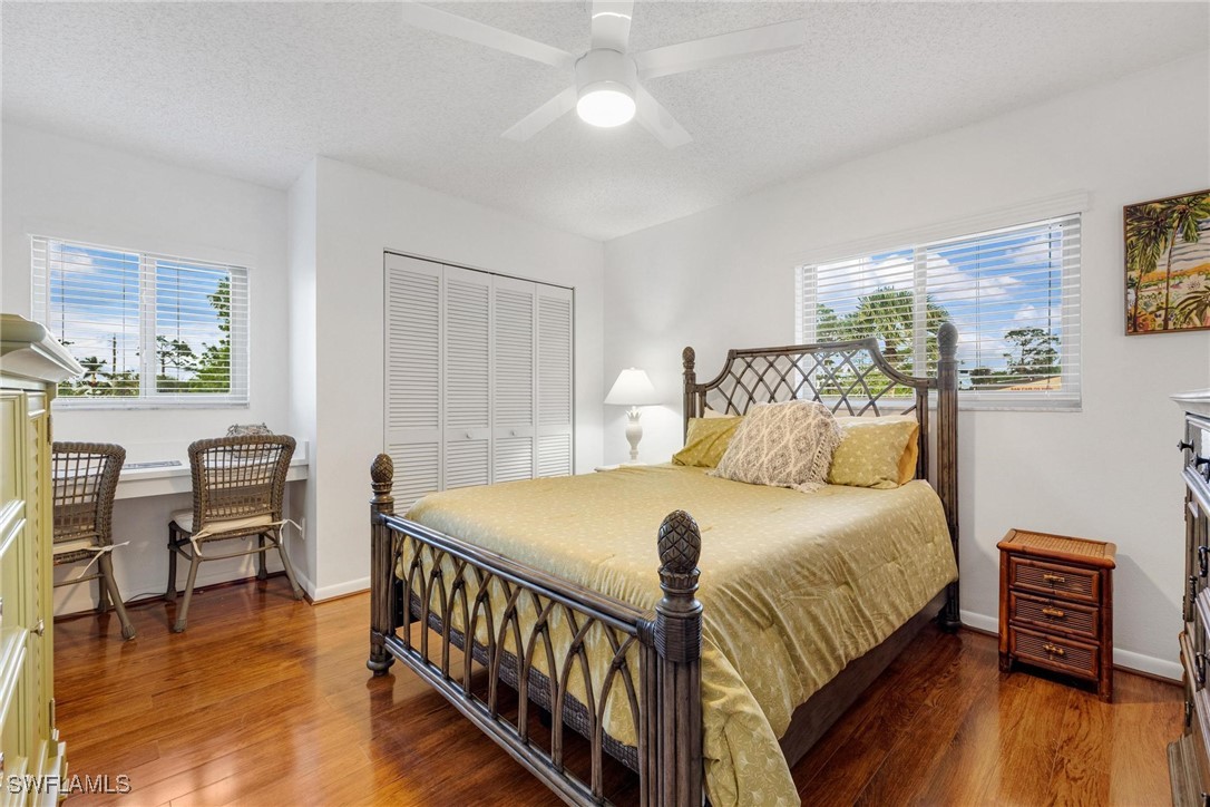 16650 Partridge Place Road, Unit 204 Fort Myers, FL 33908 - Photo 25 of 47 a bedroom with a bed and a table in it