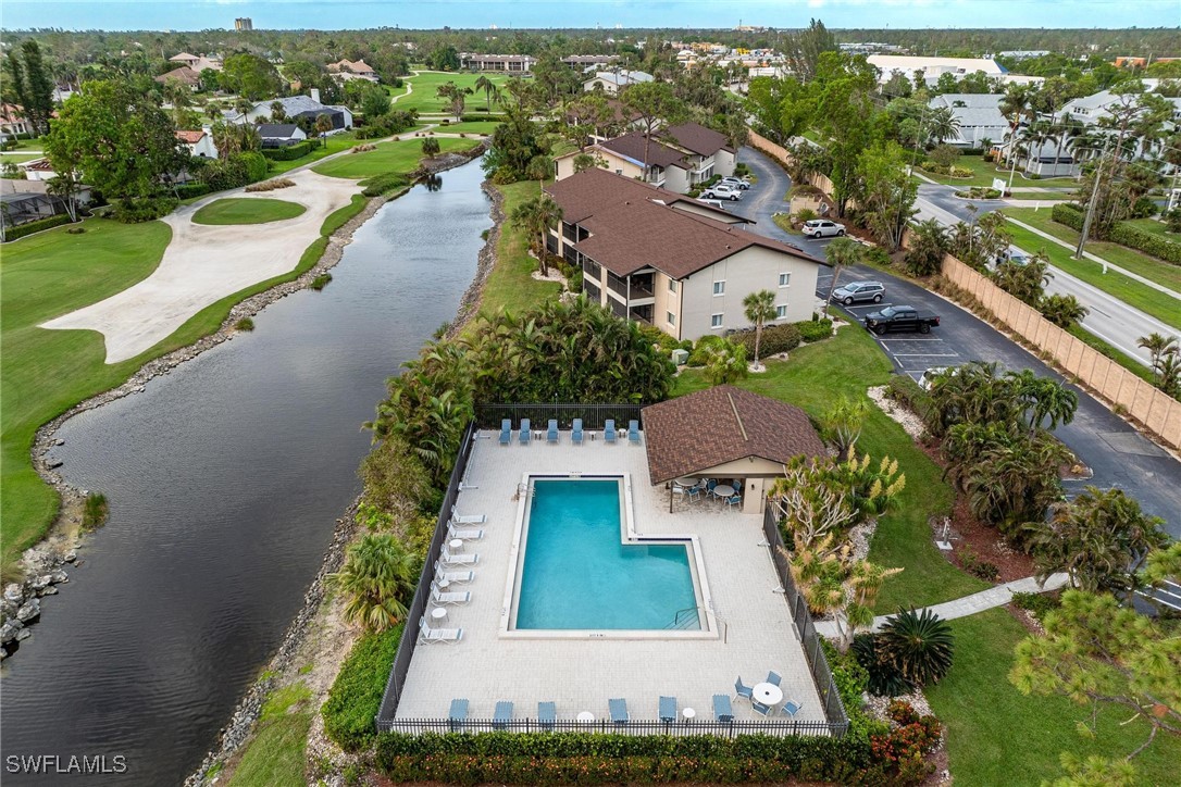 16650 Partridge Place Road, Unit 204 Fort Myers, FL 33908 - Photo 3 of 47 an aerial view of a house with a yard