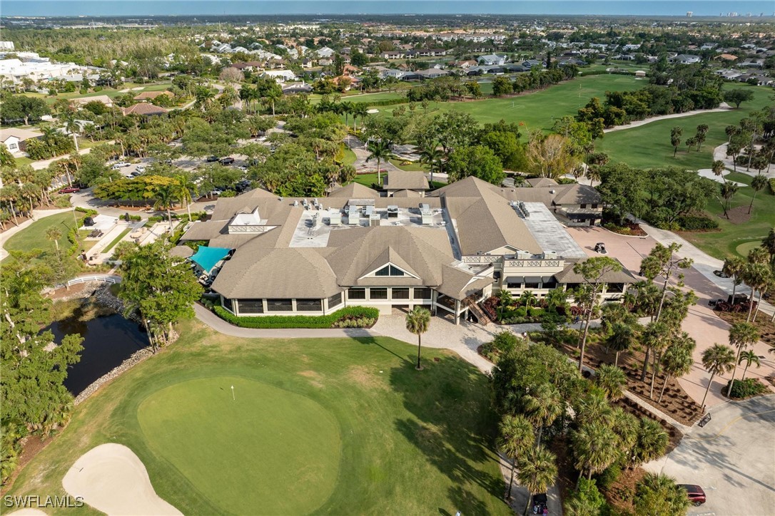 16650 Partridge Place Road, Unit 204 Fort Myers, FL 33908 - Photo 44 of 47 an aerial view of residential houses with outdoor space