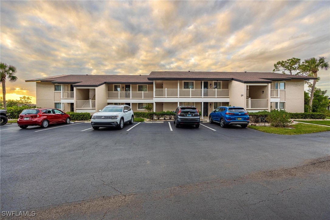 16650 Partridge Place Road, Unit 204 Fort Myers, FL 33908 - Photo 5 of 47 a view of street with parked cars