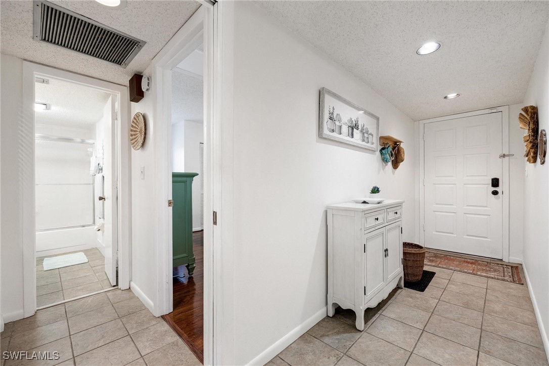 16650 Partridge Place Road, Unit 204 Fort Myers, FL 33908 - Photo 7 of 47 a bathroom with a sink and a mirror