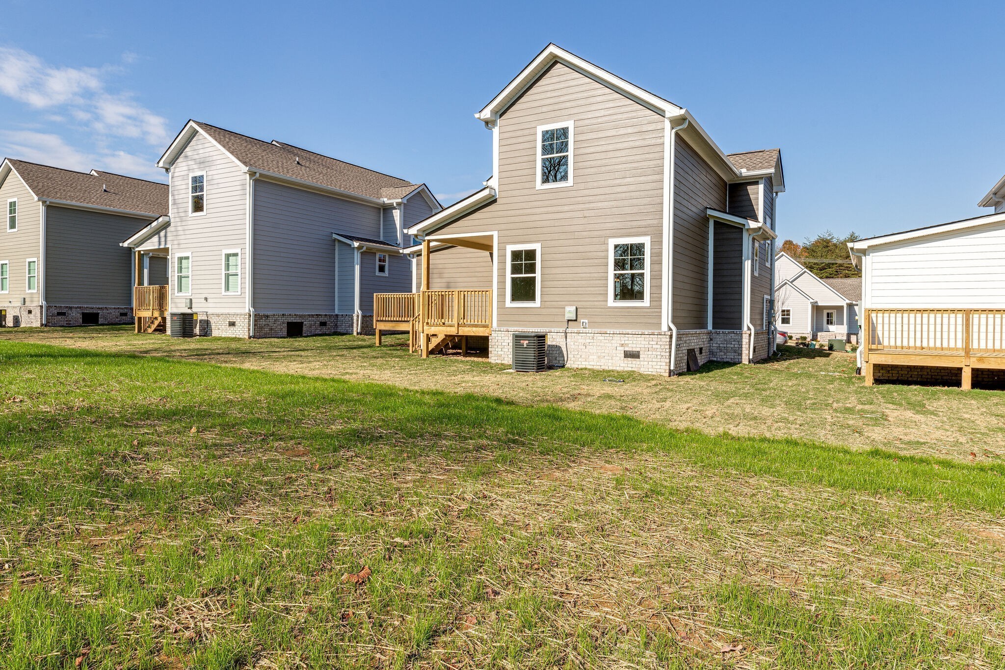 1024 Sycamore Ridge West, Unit 43 Burns, TN 37029 - Photo 58 of 59 a view of a house with a yard