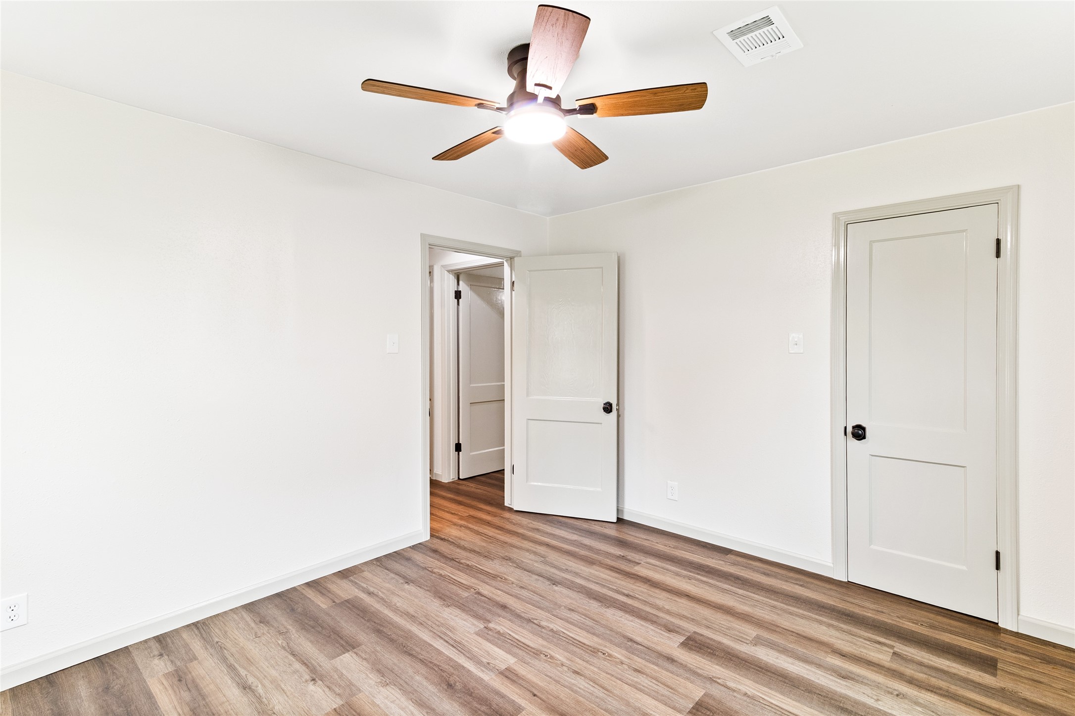 1108 Nottingham Drive Angleton, TX 77515 - Photo 15 of 23 a view of empty room with wooden floor
