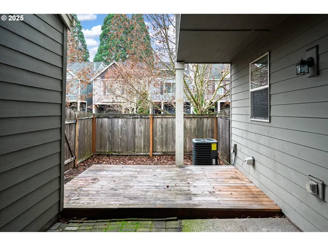 a view of a backyard and a garage