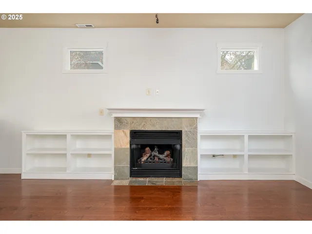 a living room with a fireplace