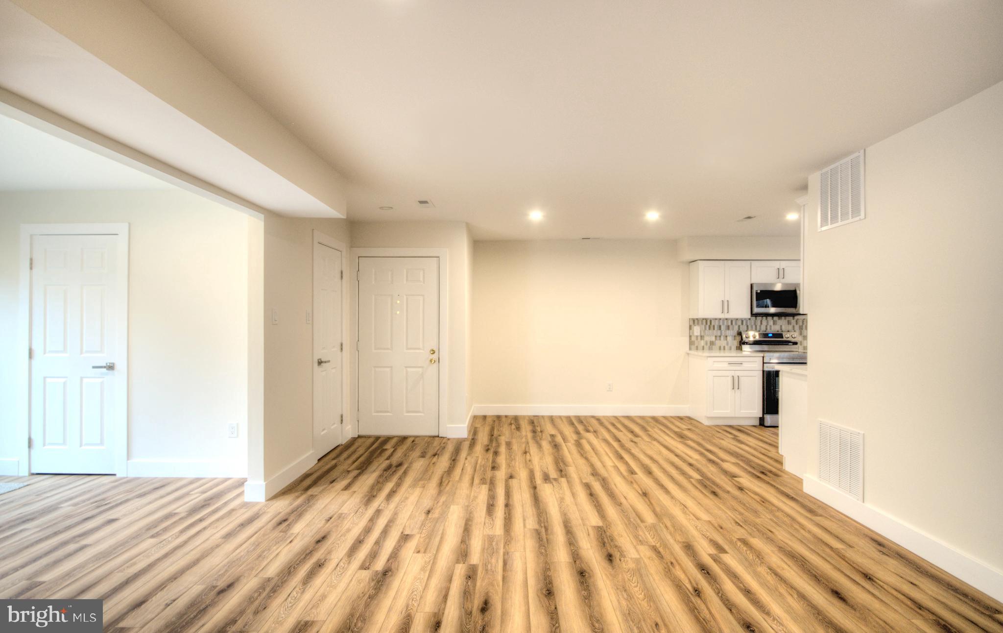 14 Pickwick Place Sewell, NJ 08080 - Photo 12 of 36 a view of a big room with wooden floor and bedroom
