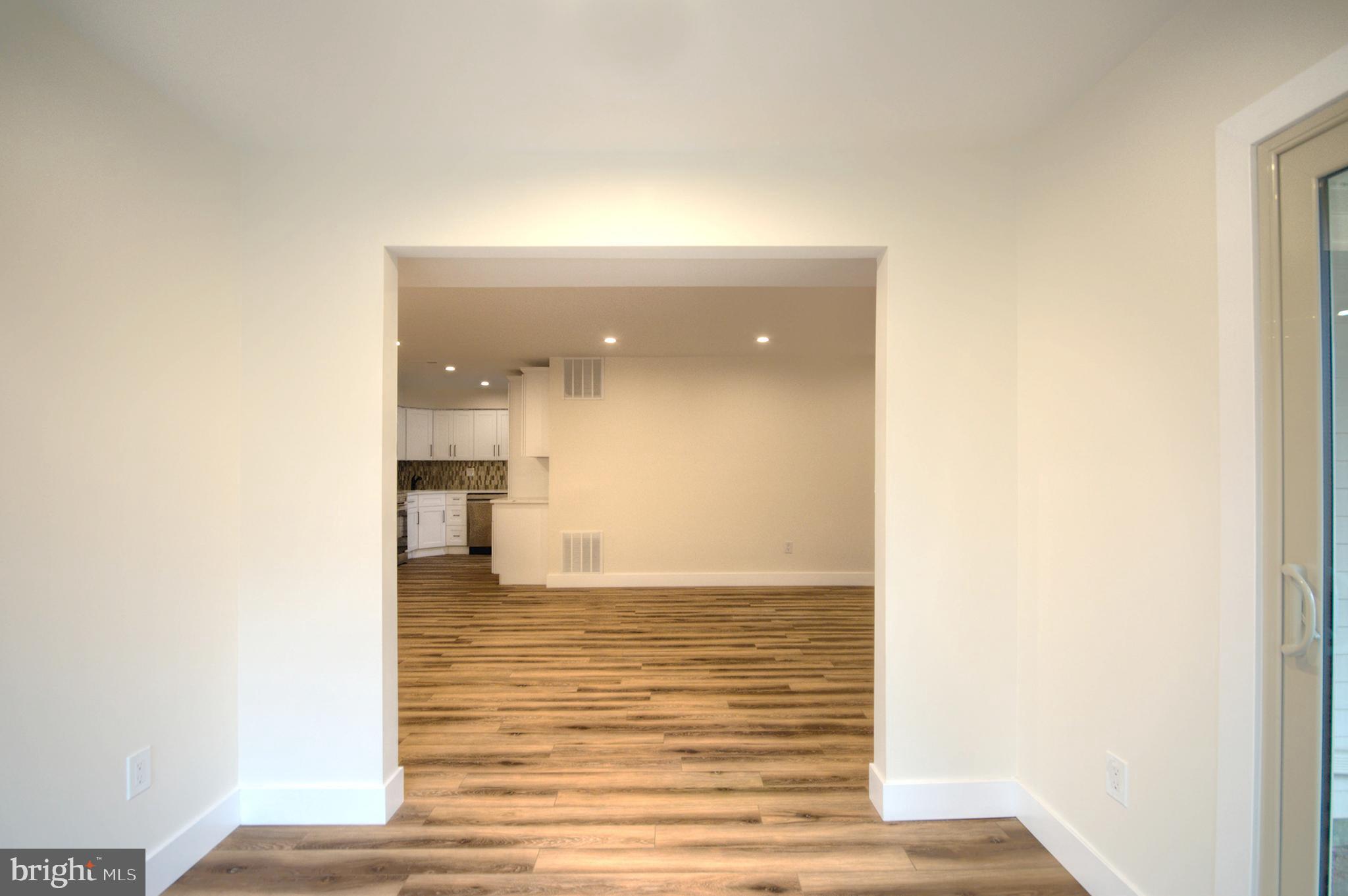 14 Pickwick Place Sewell, NJ 08080 - Photo 14 of 36 a view of empty room with wooden floor