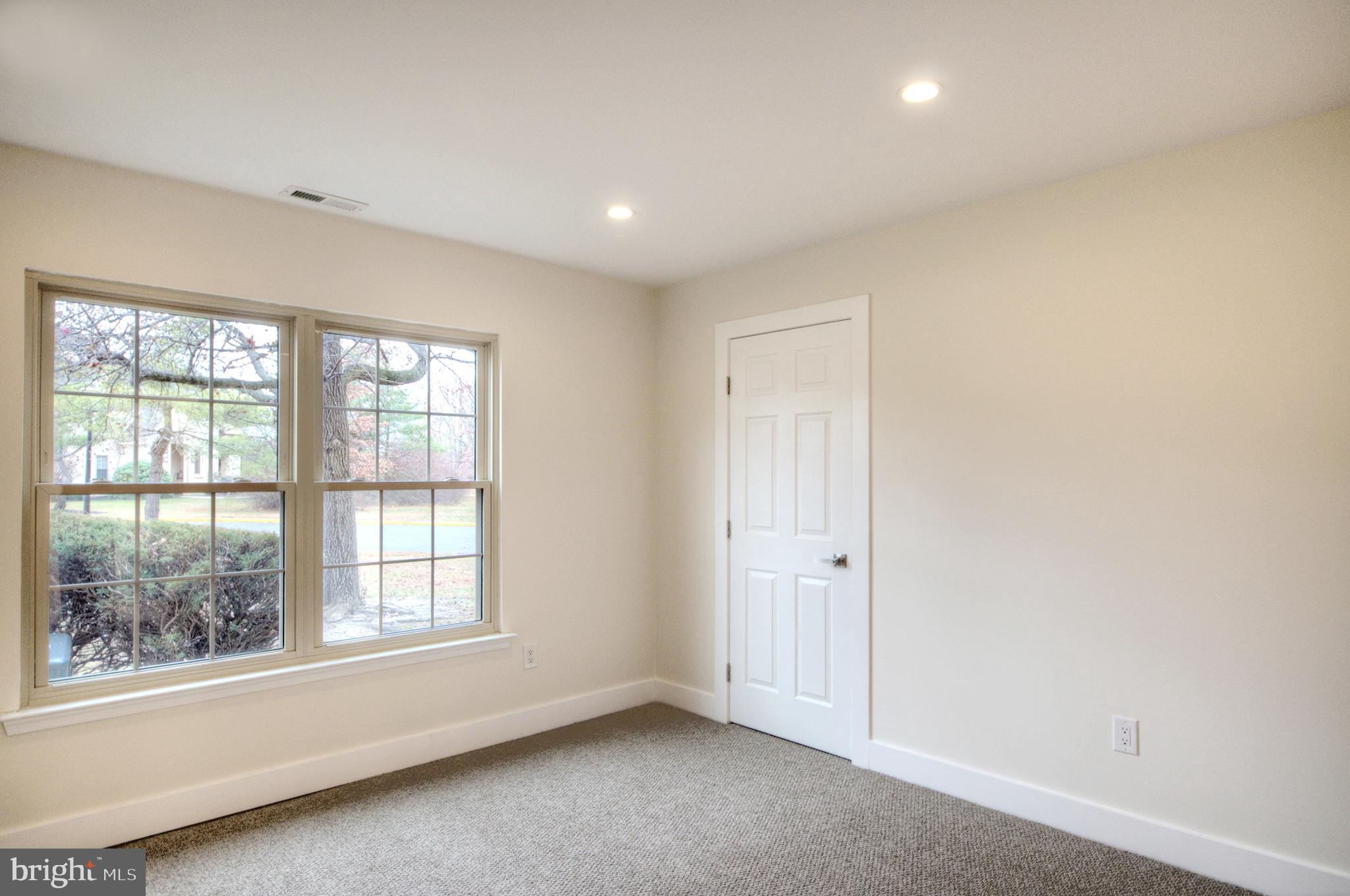 14 Pickwick Place Sewell, NJ 08080 - Photo 25 of 36 an empty room with a window
