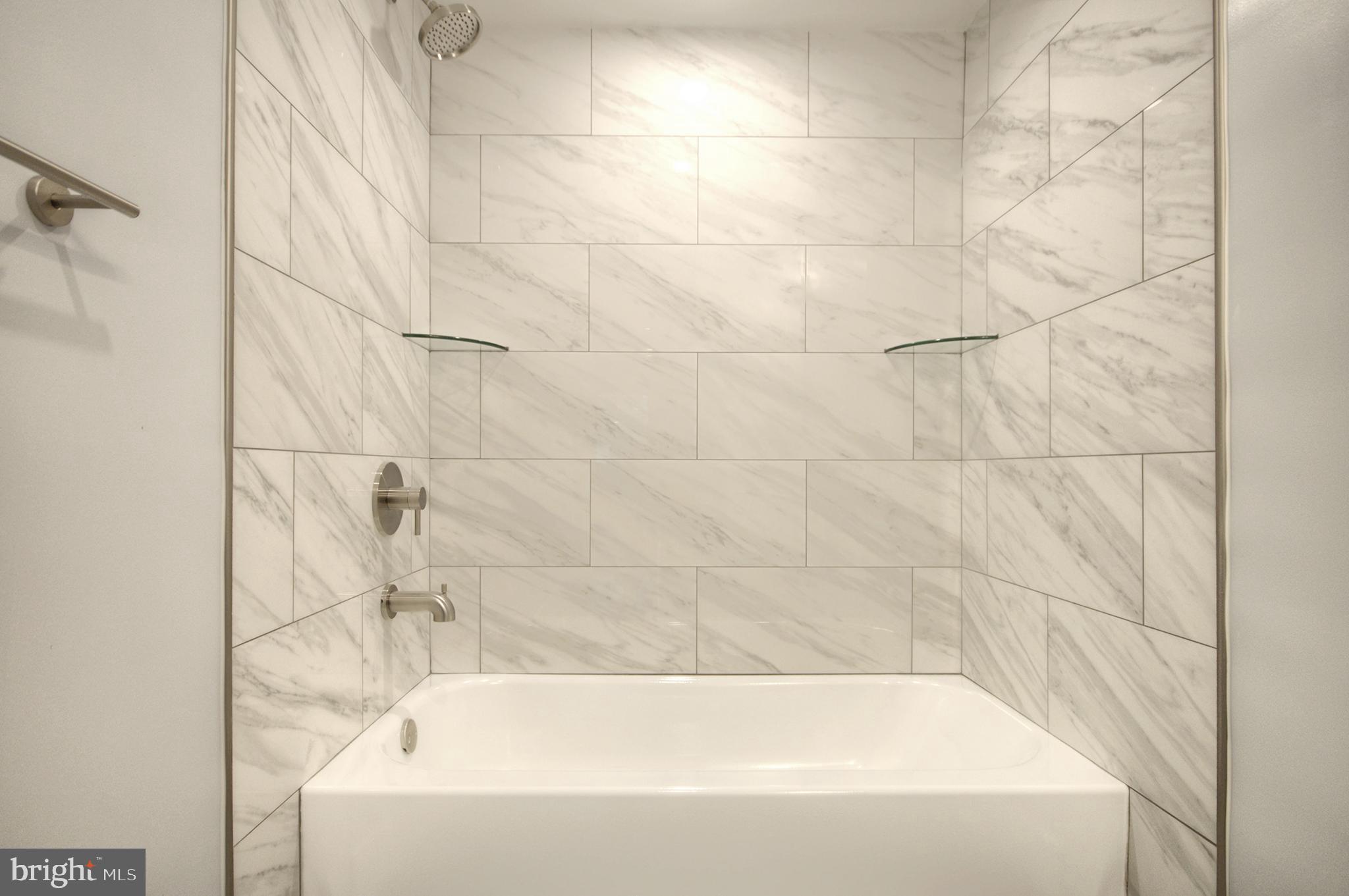 14 Pickwick Place Sewell, NJ 08080 - Photo 30 of 36 a bathroom with a bathtub