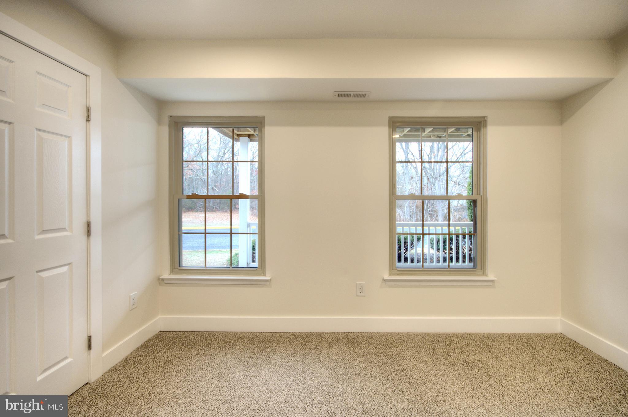 14 Pickwick Place Sewell, NJ 08080 - Photo 32 of 36 a view of an empty room with a window
