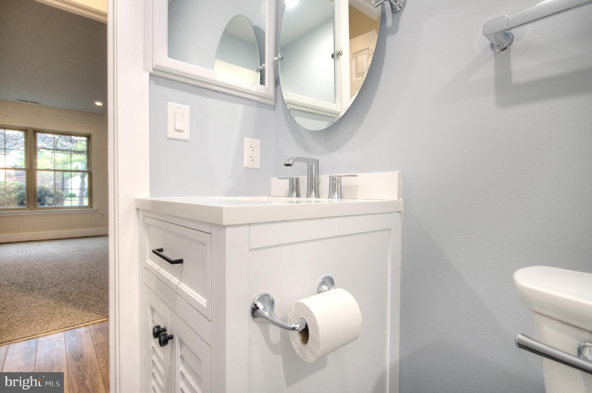14 Pickwick Place Sewell, NJ 08080 - Photo 34 of 36 a bathroom with a sink vanity and a mirror