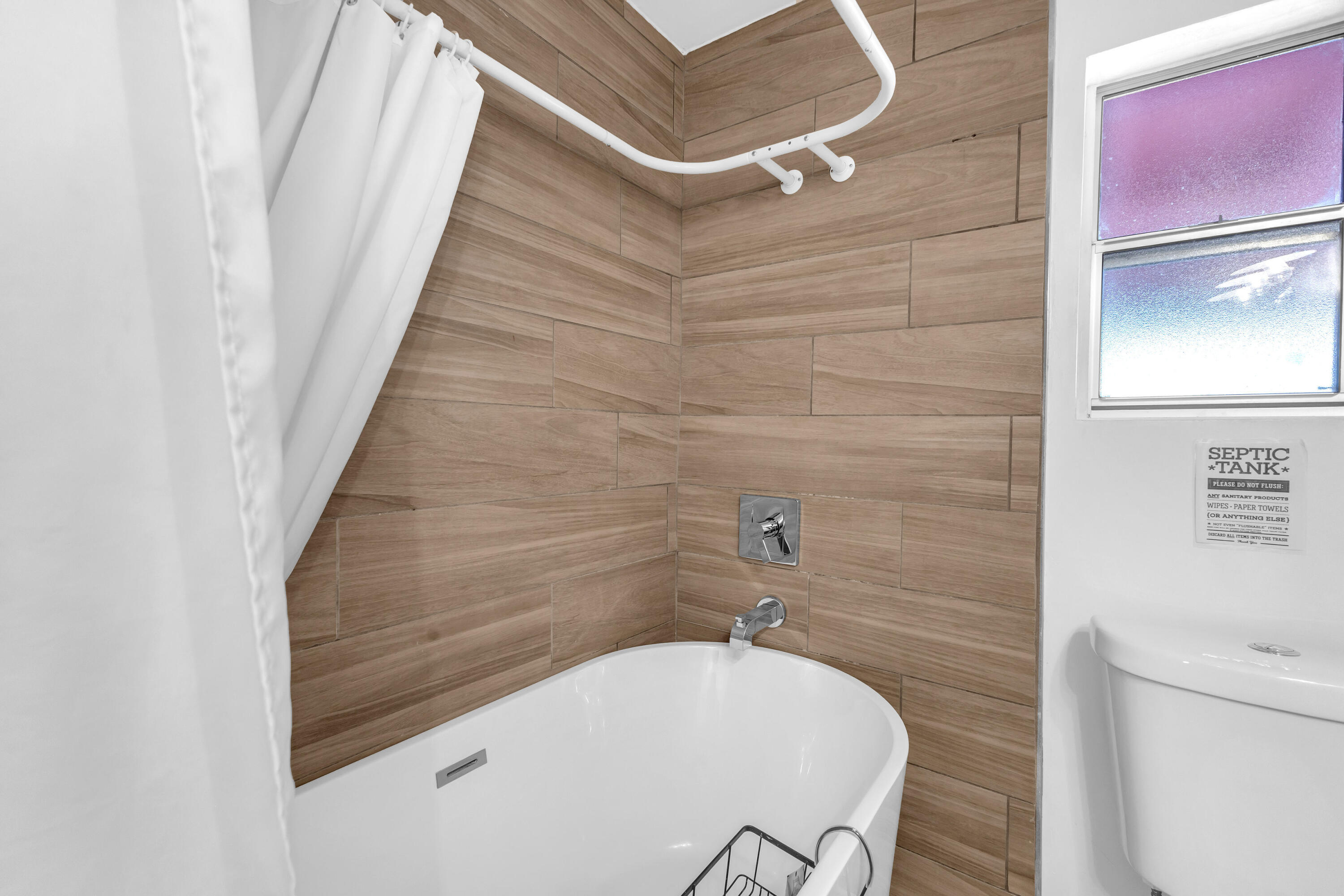 2642 Star Lane Joshua Tree, CA 92252 - Photo 28 of 76 a bathroom with a granite countertop bathtub sink and toilet