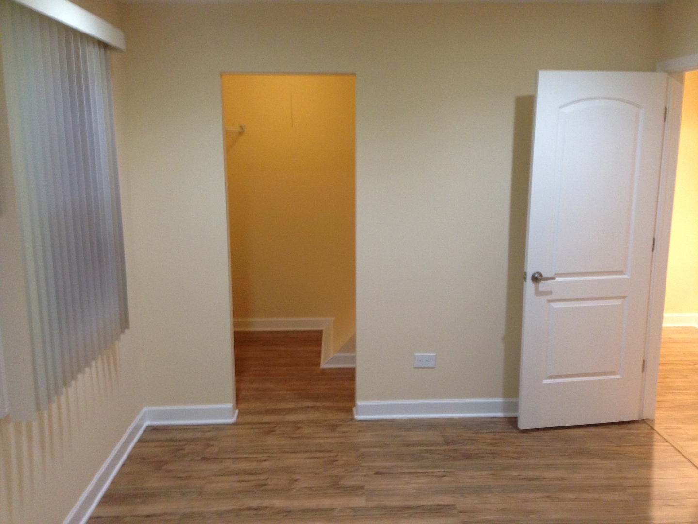 672 Cleo Court Wheeling, IL 60090 - Photo 17 of 20 a view of a hallway with wooden floor