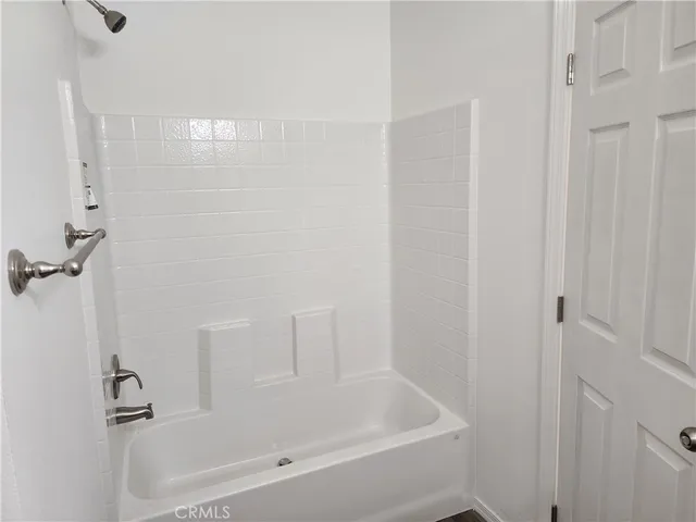 a close view of a bathtub in bathroom