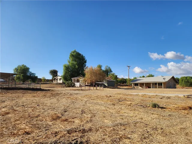 a view of a large body of water with a building in the background