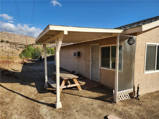 a view of balcony with furniture
