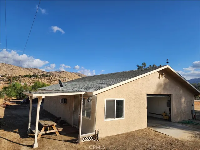 a view of a yard with an outdoor space