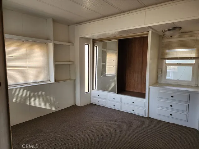 a room with furniture and window