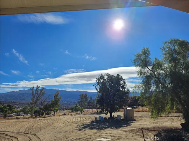 a view of house with yard