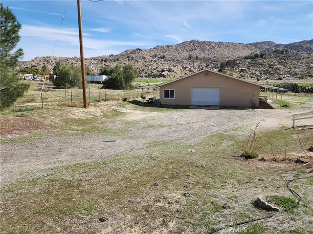 a view of a golf course with a building