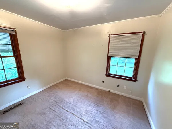 an empty room with a window