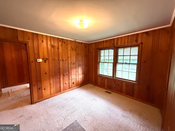 an empty room with windows