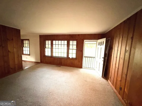 an empty room with windows